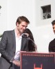 Robert Pattinson speaks to the fans while Taylor Lautner listens at the TWILIGHT TRIO HANDPRINT AND FOOTPRINT CEREMONY | ©2011 Sue Schneider