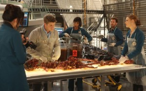 The Jeffersonian team examine the remains of a country singer in BONES "Big in the Phillipines" | © 2014 Patrick McElhenney/FOX