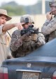 Director Jonathan Liebesman and Aaron Eckhart on the set of BATTLE: LA | ©2011 Sony