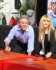 Ross Bagdasrian Jr. and Janice Bagdasarian sign the cement at the ALVIN AND THE CHIPMUNKS HAND & FOOTPRINT CEREMONY | ©2011 Sue Schneider