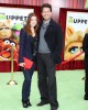 Alyson Hannigan and Alexis Denisof at the World Premiere of Disney's THE MUPPETS | ©2011 Sue Schneider