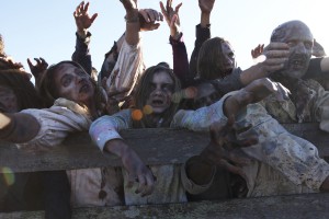 Zombies attack in THE WALKING DEAD - Season 2 finale - "Behind The Dying Fire" | ©2012 AMC/Gene Page