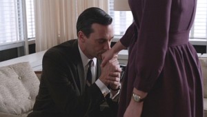Jon Hamm as Don Draper and Elisabeth Moss as Peggy Olson in MAD MEN - Season 5 - "The Other Woman" | ©2012 AMC