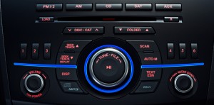 The futuristic front dash of the 2012 MAZDA3 FOUR-DOOR | ©2012 Mazda