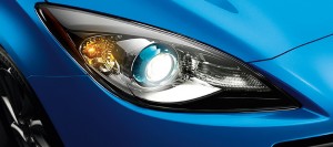 The cool looking Eagle Eye front headlight on the 2012 MAZDA3 FOUR-DOOR | ©2012 Mazda