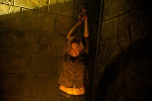 Rachel (Elizabeth Mitchell) tries to escape a deadly situation on REVOLUTION "Patriot Games" | (c) 2013 Felicia Graham/NBC