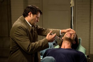 Misha Collins as Castiel and Jared Padalecki as Sam in SUPERNATURAL "First Born" | © 2014 The CW/Diyah Pera