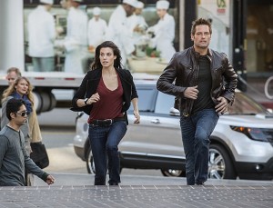 Gabriel (Josh Holloway) and Riley (Meghan Ory) chase down a witness protection suspect on INTELLIGENCE | © 2014 Neil Jacobs/CBS Gabriel (Josh Holloway) and Riley (Meghan Ory) chase down a witness protection suspect on INTELLIGENCE | © 2014 Neil Jacobs/CBS