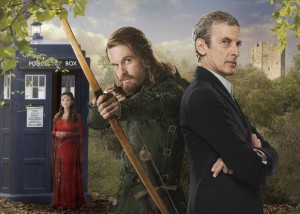 Clara (Jenna Coleman), Robin (Tom Riley), and the Doctor (Peter Capaldi) in DOCTOR WHO - Series 8 - "Robot of Sherwood"  | ©2014 BBC/BBC Worldwide/Adrian Rogers