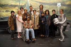 Jensen Ackles as Dean and Jared Padalecki as Sam surrounded by cast of Supernatural: The Musical! in SUPERNATURAL - Season 10 - "Fan Fiction" | ©2014 The CW/Diyah Pera