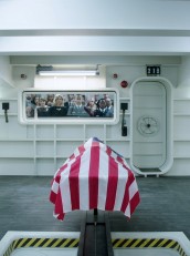 A female who was murdered on board the spaceship ASCENSION gets sent off into space in "Night 1" | © 2014 Syfy