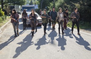 The cast of THE WALKING DEAD approaches the walls of Alexandria in THE WALKING DEAD | © 2015 Gene Page/AMC