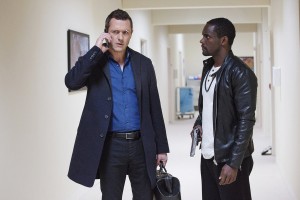 Jason O'Mara as Dr. John Ellison and Chris Chalke as Darius Bishop in COMPLICATIONS | © 2015 Bob Mahoney/USA Network