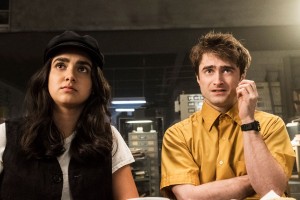 Geraldine Viswanathan and Daniel Radcliffe in MIRACLE WORKERS - Season 1 - "13 Days"| ©2019 TBS/Curtis Baker