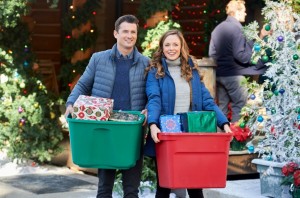 Wes Brown and Rachel Boston in CHECK INN FOR CHRISTMAS | ©2019 Hallmark Channel