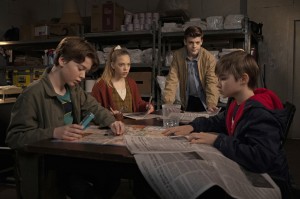 Christian Michael Cooper as Young Sam, Elle McKinnon as Young Caitlin, Paxton Singleton as Young Dean and Liam Hughes as Young Travis in SUPERNATURAL - Season 15 - "Drag Me Away (From You)" | © 2020 The CW Network/Colin Bentley