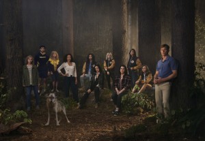 (L-R): Christina Ricci as Misty, Steven Krueger as Ben Scott, Samantha Hanratty as Teen Misty, Tawny Cypress as Taissa, Jasmin Savoy Brown as Teen Taissa, Juliette Lewis as Natalie, Sophie Thatcher as Teen Natalie, Melanie Lynskey as Shauna, Sophie Nélisse as Shauna, Ella Purnell as Teen Jackie and Warren Kole as Jeff Sadecki in YELLOWJACKETS - Season 1 | ©2021 Showtime/Brendan Meadows